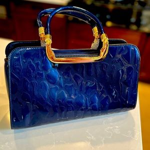 NWOT SJLN handbag blue cheetah with gold accents